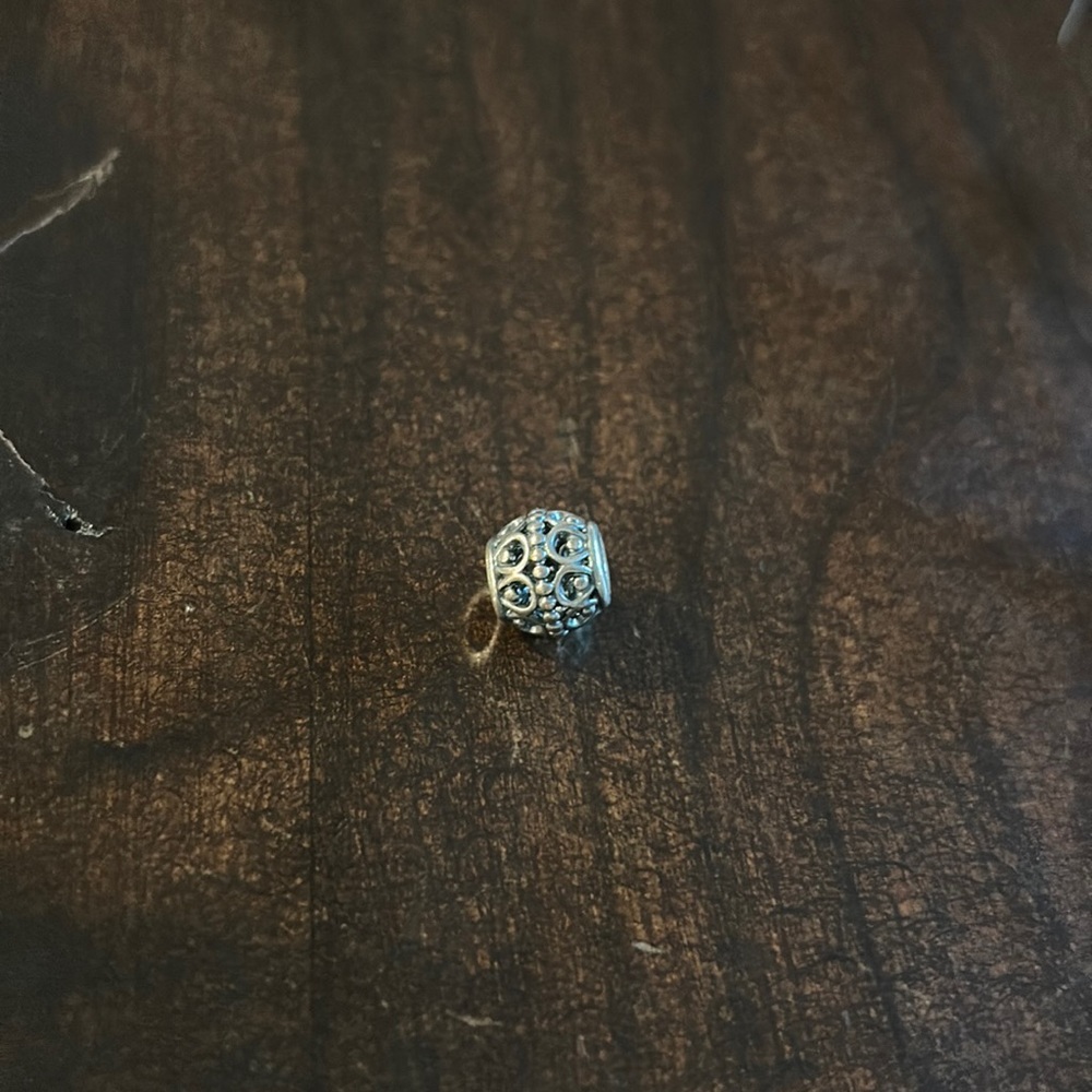 Beautiful silver toned charm from Pandora. Like new!
